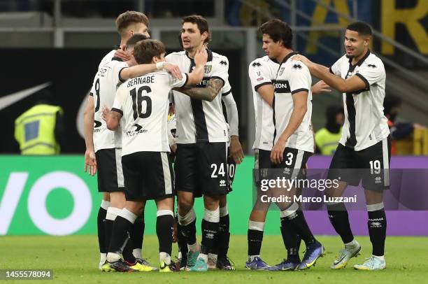 Stanko Juric of Parma Calcio celebrates with teammates after scoring the team's first goal during the Coppa Italia Round of 16 match between FC...