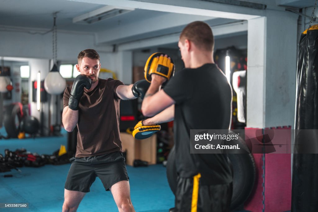 Practising Boxing Caucasian Males At Boxing Practice High-Res Stock Photo - Getty Images