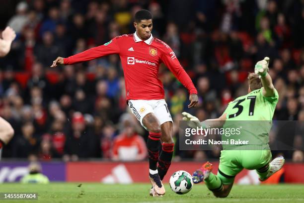 Marcus Rashford of Manchester United scores the team's second goal past Ashley Maynard-Brewer of Charlton Athletic during the Carabao Cup Quarter...