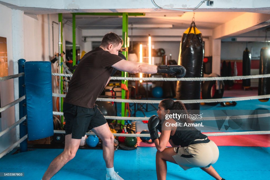 Spar Rope Boxing Diverse Male And Female Boxers Spar Fighting High-Res Stock Photo ...