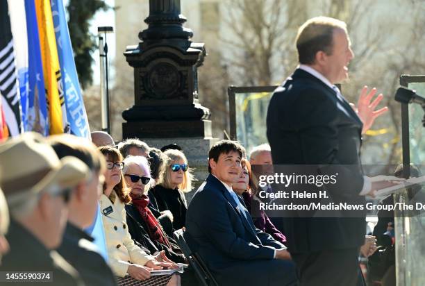 First gentleman Marlon Reis listens to Governor Jared Polis gives his inauguration speech during inauguration day on January 10, 2023 In Denver,...