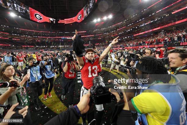 Stetson Bennett of the Georgia Bulldogs celebrates after defeating the TCU Horned Frogs in the College Football Playoff National Championship game at...