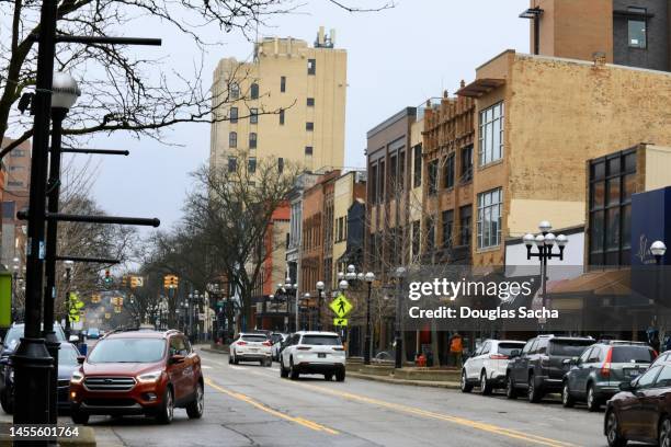 urban street with businesses - ann arbor mi stock pictures, royalty-free photos & images