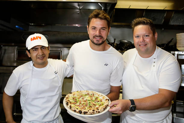 AUS: Stan Wawrinka Launches 'Stan Pizza' At Baby Pizza