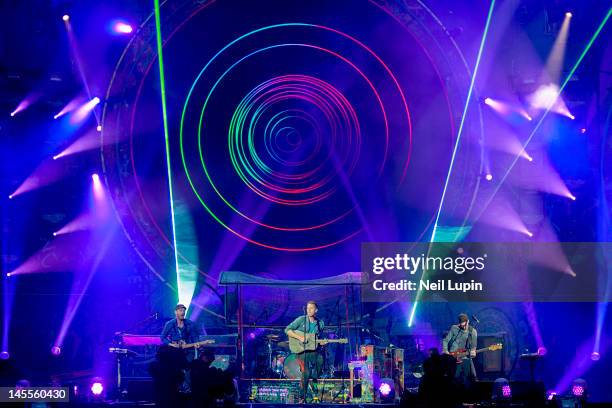 Jonny Buckland, Chris Martin and Guy Berryman of Coldplay perform on stage at Emirates Stadium on June 1, 2012 in London, United Kingdom.