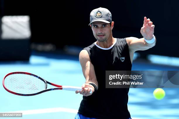 Marcos Giron of the USA plays a return to JJ Wolf of the USA in their singles match during day three of the 2023 ASB Classic Men's at the ASB Tennis...