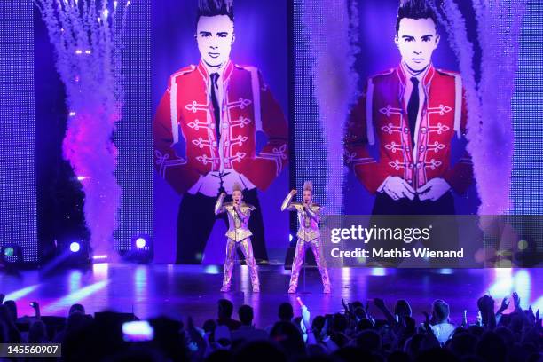 Jedward perform on stage at "The Dome 62" at the Colosseum Theater on June 1, 2012 in Essen, Germany.