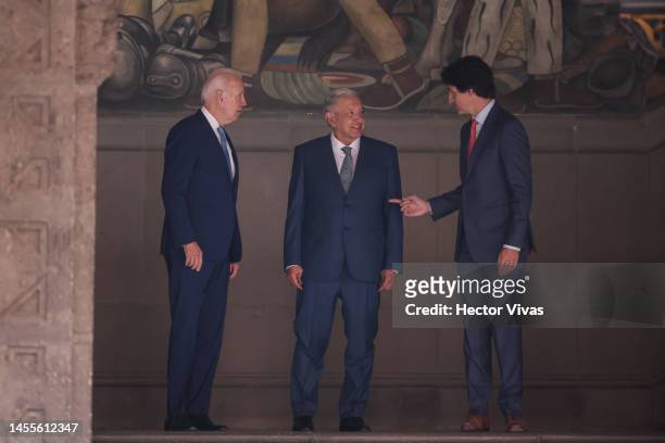 President Joe Biden, President of Mexico Andres Manuel Lopez Obrador and Prime Minister of Canada Justin Trudeau talk before a message for the media...