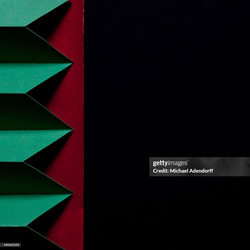 Abstract paper design in red and green