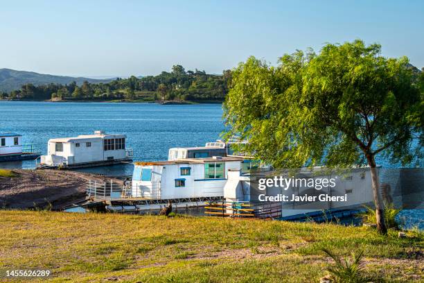 houseboats on the shores of the lake. embalse, cordoba, argentina. - cordoba argentina ストックフォトと画像