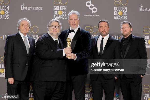 Gary Ungar, Guillermo del Toro, Mark Gustafson, Patrick McHale, and Corey Campodonico pose with the award for Best Animated Feature for "Guillermo...