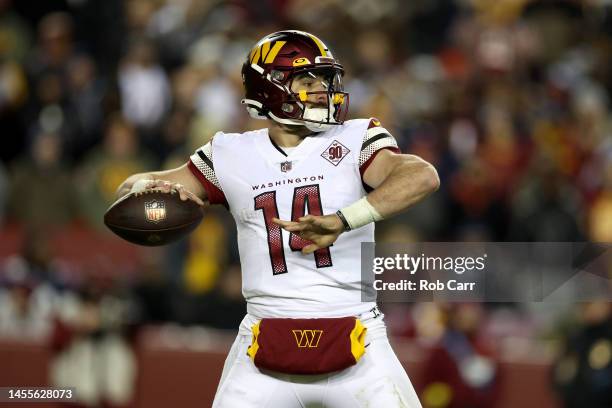 Quarterback Sam Howell of the Washington Commanders drops back to pass against the Dallas Cowboys at FedExField on January 08, 2023 in Landover,...