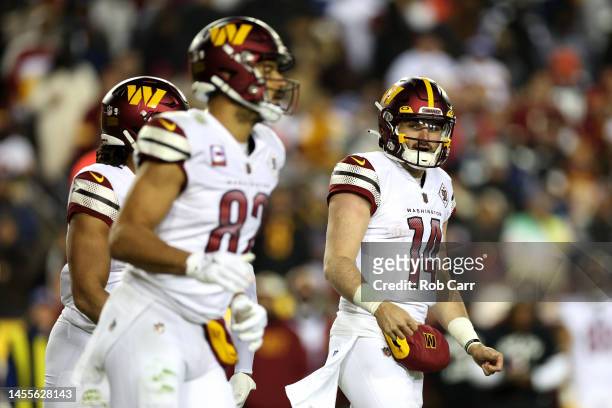 Quarterback Sam Howell of the Washington Commanders looks on against the Dallas Cowboys at FedExField on January 08, 2023 in Landover, Maryland.
