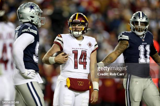 Quarterback Sam Howell of the Washington Commanders looks on against the Dallas Cowboys at FedExField on January 08, 2023 in Landover, Maryland.