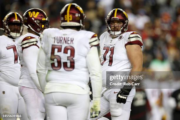 Guard Wes Schweitzer of the Washington Commanders looks on against the Dallas Cowboys at FedExField on January 08, 2023 in Landover, Maryland.