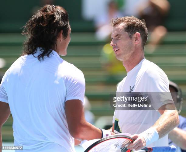 Andy Murray of Great Britain and Zhang Zhizhen of China shake hands after the match during day two of the 2023 Kooyong Classic at Kooyong on January...