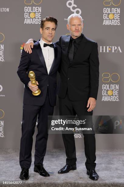 Colin Farrell and Martin McDonagh, winners of Best Picture - Musical/Comedy for "The Banshees of Inisherin", pose in the press room during the 80th...