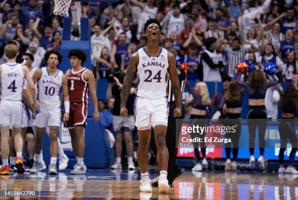 Adams Jr. #24 of the Kansas Jayhawks celebrates a basket by Jalen Wilson against the Oklahoma Sooners in the second half at Allen Fieldhouse on...