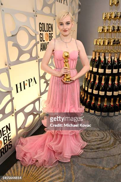 Julia Garner poses with the Best Actress in a Limited or Anthology Series or Television Film award for "Inventing Anna" at the 80th Annual Golden...