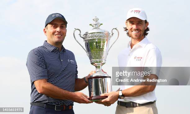 Francesco Molinari, Captain of Continental Europe, and Tommy Fleetwood, Captain of Great Britain and Ireland, pose with the trophy prior to the Hero...