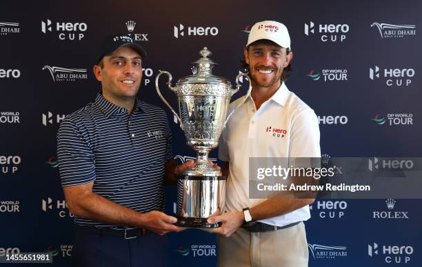 Francesco Molinari, Captain of Continental Europe, and Tommy Fleetwood, Captain of Great Britain and Ireland, pose with the trophy prior to the Hero...