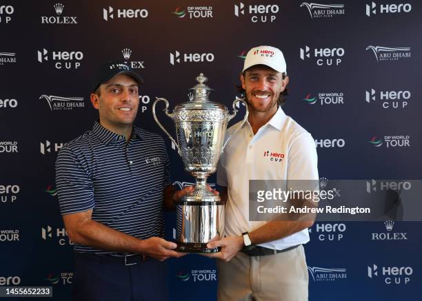 Francesco Molinari, Captain of Continental Europe, and Tommy Fleetwood, Captain of Great Britain and Ireland, pose with the trophy prior to the Hero...