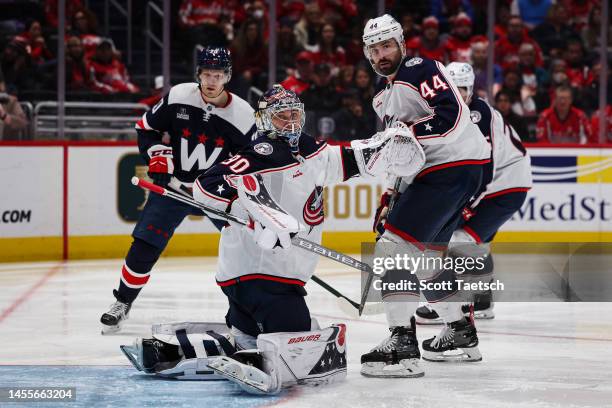 Elvis Merzlikins of the Columbus Blue Jackets follows the puck after making a save against the Washington Capitals during the second period of the...