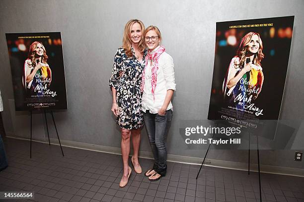 Country musician Chely Wright and wife Lauren Blitzer attend the "Chely Wright: Wish Me Away" New York Screening at Quad Cinema on June 1, 2012 in...