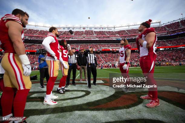 Captains of the San Francisco 49ers and the Arizona Cardinals during the coin toss before the game at Levi's Stadium on January 8, 2023 in Santa...