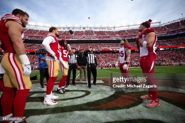 Captains of the San Francisco 49ers and the Arizona Cardinals during the coin toss before the game at Levi's Stadium on January 8, 2023 in Santa...