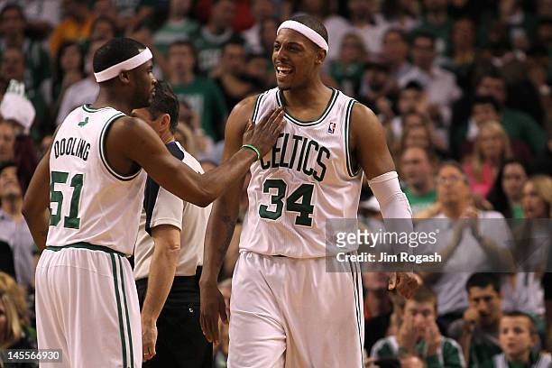 Keyon Dooling and Paul Pierce of the Boston Celtics react in the second half against the Miami Heat in Game Three of the Eastern Conference Finals in...