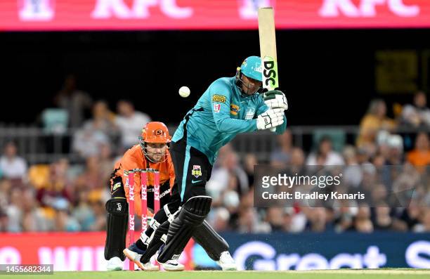 Usman Khawaja of the Heat plays a shot during the Men's Big Bash League match between the Brisbane Heat and the Perth Scorchers at The Gabba, on...
