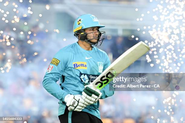 Usman Khawaja of the Heat takes to the field during the Men's Big Bash League match between the Brisbane Heat and the Perth Scorchers at The Gabba,...