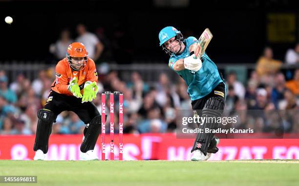 Jimmy Peirson of the Heat plays a shot during the Men's Big Bash League match between the Brisbane Heat and the Perth Scorchers at The Gabba, on...