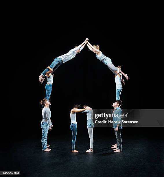 High Risk Acrobats 3,393 Acrobats Teamwork Stock Photos, High-Res Pictures, and Images ...