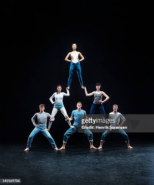 human pyramid - prop stock pictures, royalty-free photos & images