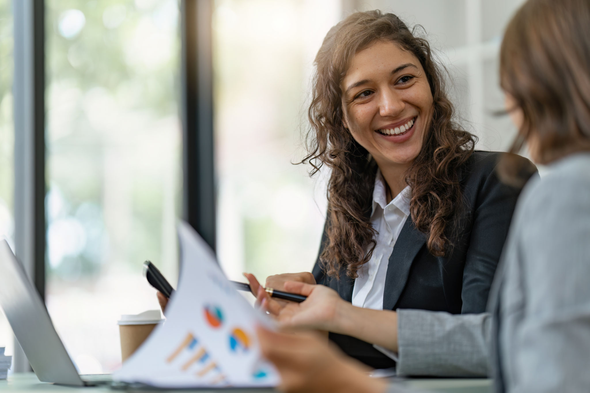 Business People Meeting to discuss and brainstorming the financial report paperwork in home office. Financial advisor teamwork and accounting concept Business People Meeting to discuss and brainstorming the financial report paperwork in home office. Financial advisor teamwork and accounting concept