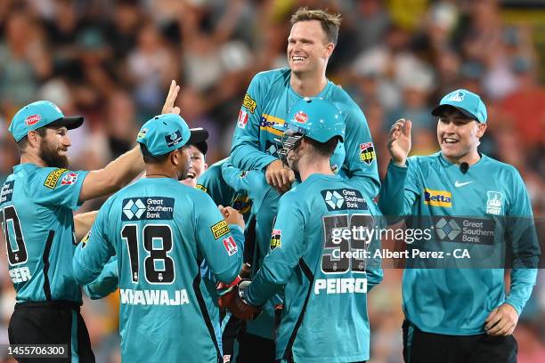 Matt Kuhnemann of the Heat celebrates with team mates after dismissing Stephen Eskinazi of the Scorchers during the Men's Big Bash League match...