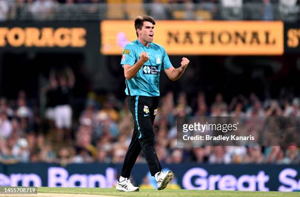 Xavier Bartlett of the Heat celebrates taking the wicket of Cameron Bancroft of the Scorchers during the Men's Big Bash League match between the...