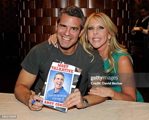 Television personalities Andy Cohen and Vicki Gunvalson appear at Cohen's book signing at Queue Bar at The Cosmopolitan of Las Vegas on June 1, 2012...