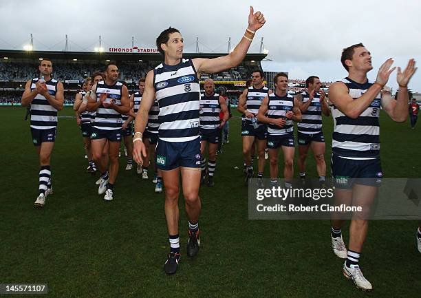The Cats celebrate after they defeated the Giants at the round 10 AFL match between the Geelong Cats and the Greater Western Sydney Giants at Simonds...
