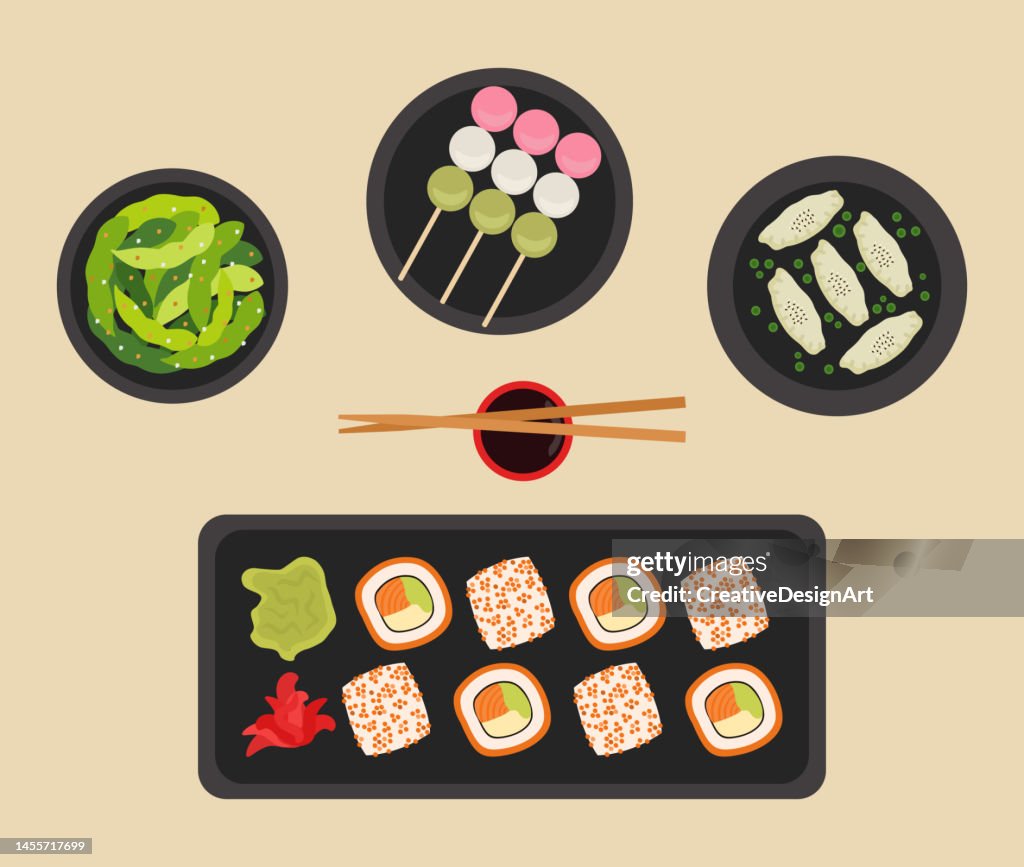 Japanese Food Plates.Top View Of Sushi Plate, Edamame, Gyoza And Dango
