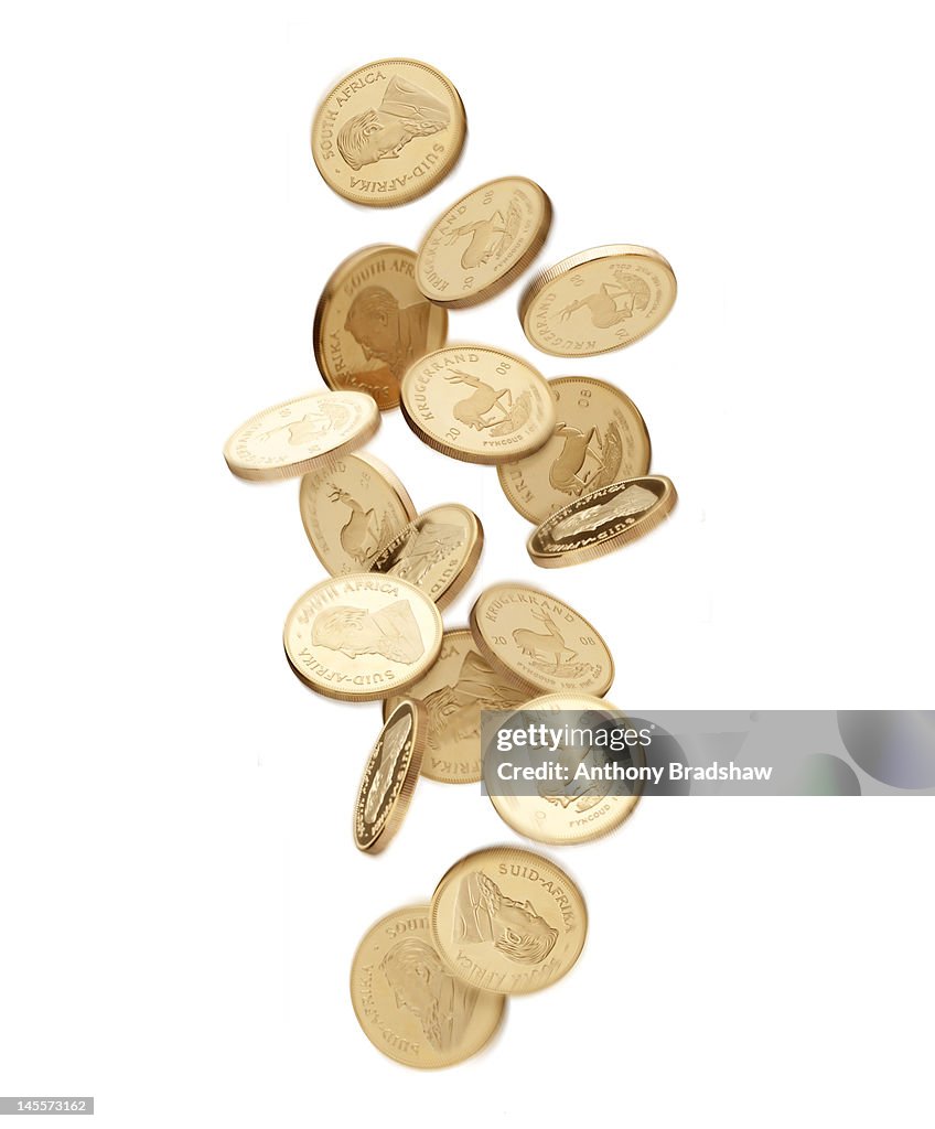 Gold coins falling from above