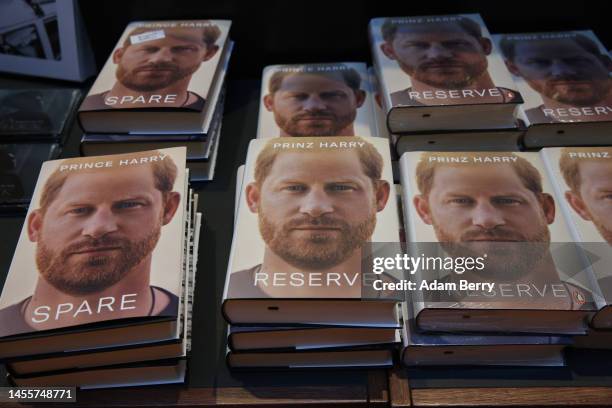 Copies of Prince Harry’s memoir “Spare” sit on display at the Dussmann das KulturKaufhaus bookshop, on January 11, 2023 in Berlin, Germany. According...