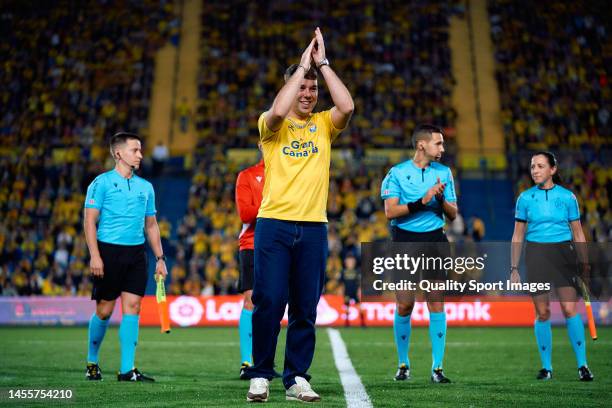 Singer Pedro Luis Dominguez Quevedo, known artistically as 'Quevedo' takes ceremonial kick-off during the match between UD Las Palmas and CD Tenerife...