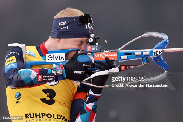 Johannes Thingnes Boe of Norway competes during the Men 20 km Individual at the BMW IBU World Cup Biathlon Ruhpolding on January 11, 2023 in...