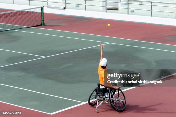 sport, athlete with disabilities, wheelchair, disability. - wheelchair tennis stock pictures, royalty-free photos & images