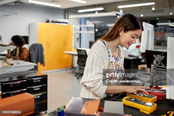 electrical engineering student working in educational lab - multimeter stock pictures, royalty-free photos & images