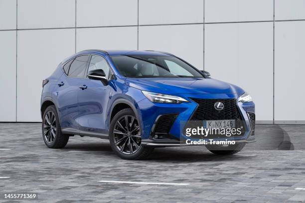lexus nx on a street - sports utility vehicle stock pictures, royalty-free photos & images