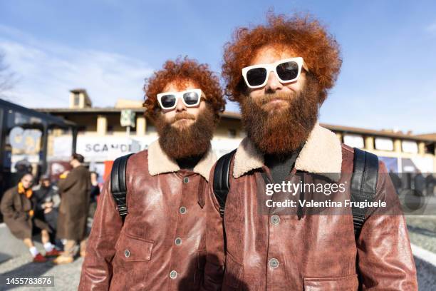 Fabrizio e Valerio Salvatori aka TwoTwins wearing aviator jacket at Fortezza Da Basso on January 11, 2023 in Florence, Italy.